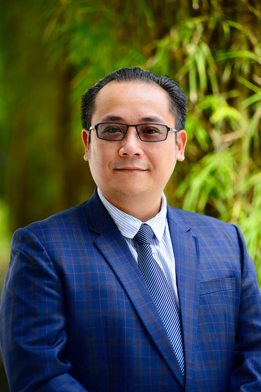 Portrait of Dr. David Nguyen, Chief Family Officer at Regulus